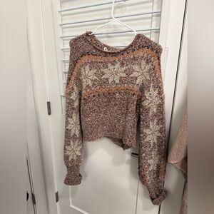 Free People Sweater Size Large fits more like a s/m. Cropped. New with tags.